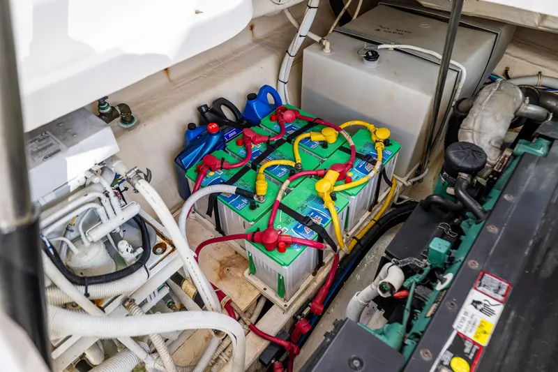 Slide: The Image of Engine compartment of 2006 Tiara Yachts 4300 Sovran with batteries and wiring. - 35