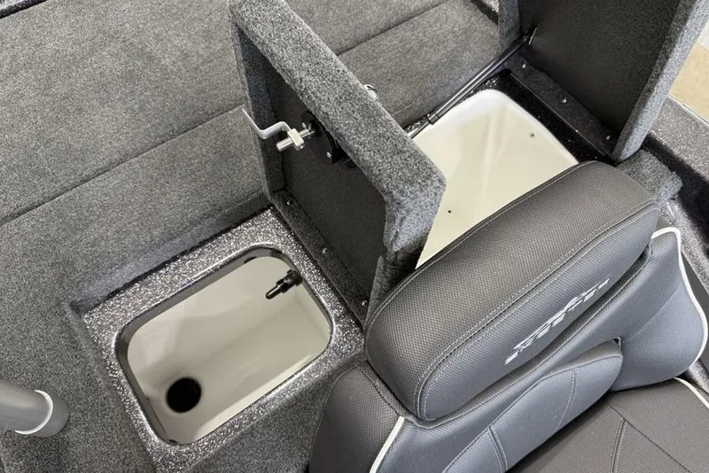 Slide: The Image of 2025 Skeeter ZX150 boat interior with storage compartments and seating. - 10