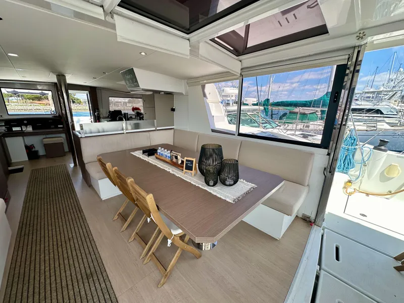 Slide: The Image of Modern interior of 2021 Bali 4.8 yacht with dining area and marina view. - 32