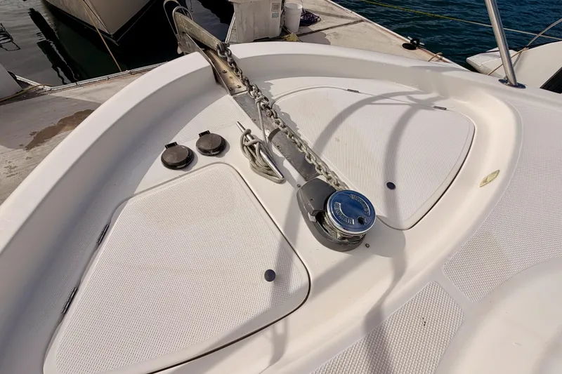 Slide: The Image of 2001 Maxum 4600 SCB Limited Edition yacht deck with anchor chain and winch. - 15