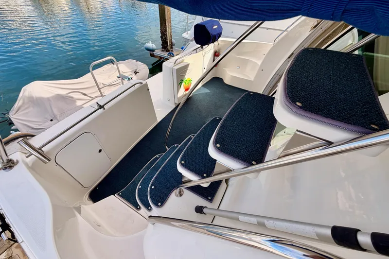 Slide: The Image of 2001 Maxum 4600 SCB Limited Edition yacht with carpeted steps and sleek design. - 21