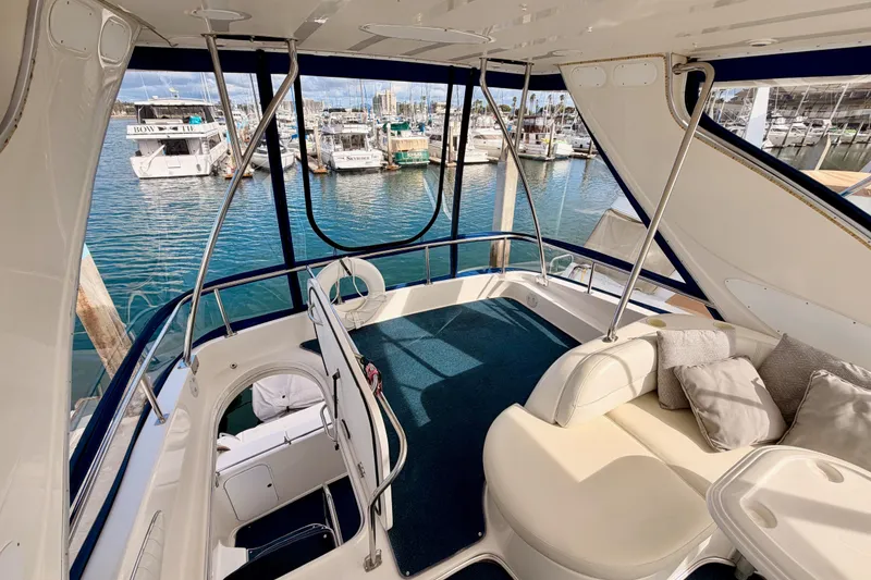 Slide: The Image of Luxurious 2001 Maxum 4600 SCB yacht interior with marina view. - 25