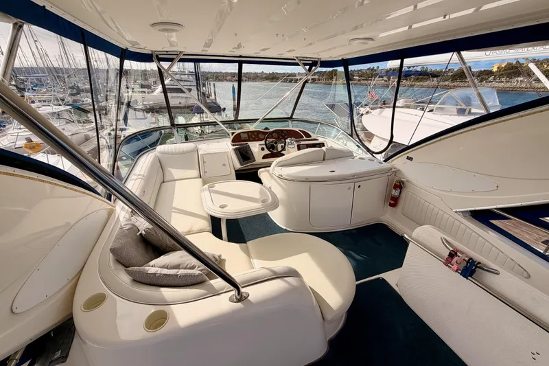 Slide: The Image of Luxurious interior of 2001 Maxum 4600 SCB Limited Edition yacht with elegant seating and helm. - 26