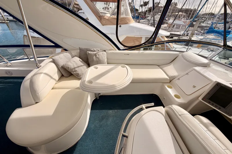 Slide: The Image of Luxurious interior of 2001 Maxum 4600 SCB Limited Edition yacht with plush seating and table. - 27