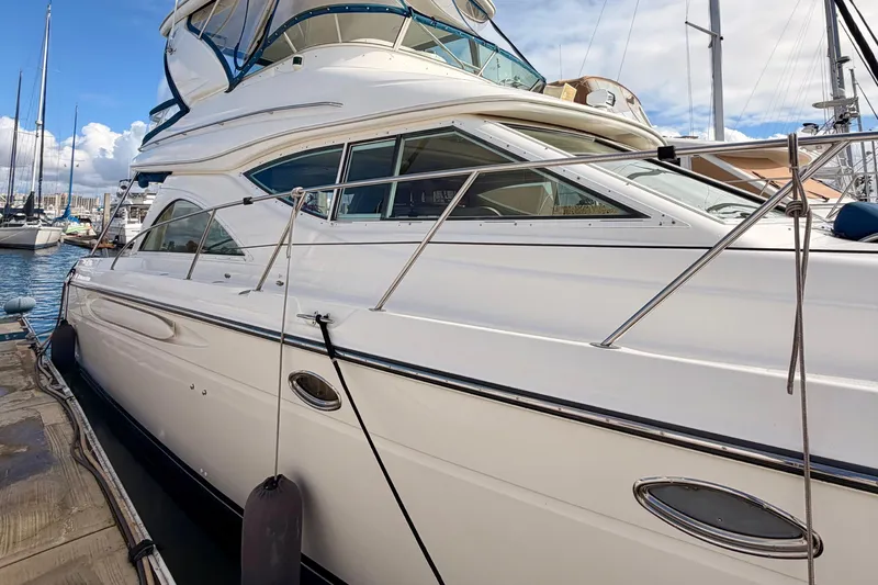 Slide: The Image of 2001 Maxum 4600 SCB Limited Edition yacht docked at marina. - 3