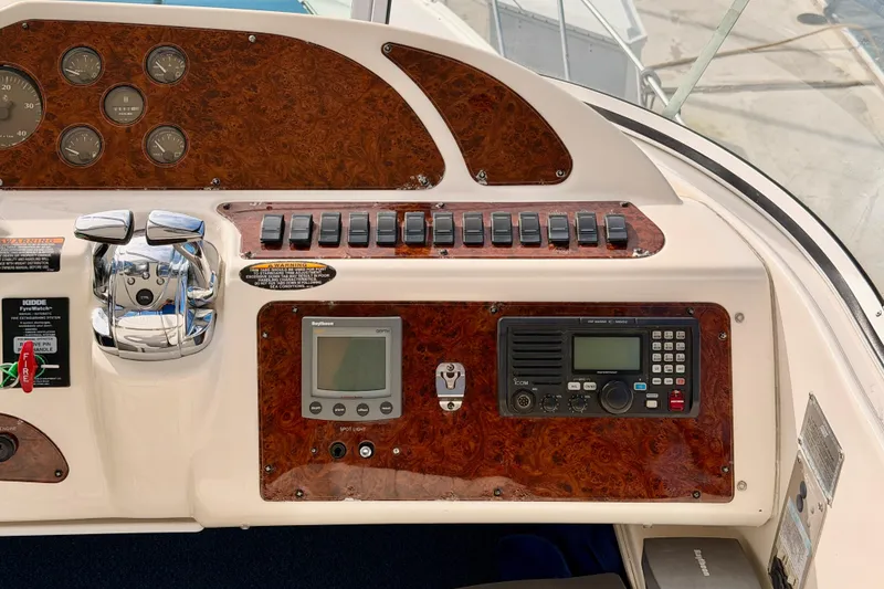 Slide: The Image of Control panel of a 2001 Maxum 4600 SCB Limited Edition yacht with navigation instruments. - 30