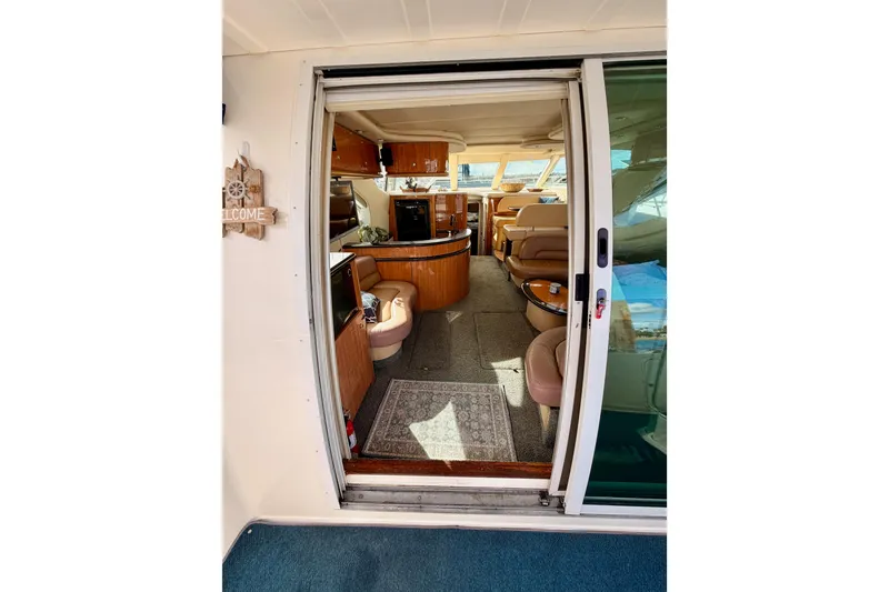 Slide: The Image of Interior view of 2001 Maxum 4600 SCB Limited Edition yacht, featuring luxurious seating and elegant design. - 38