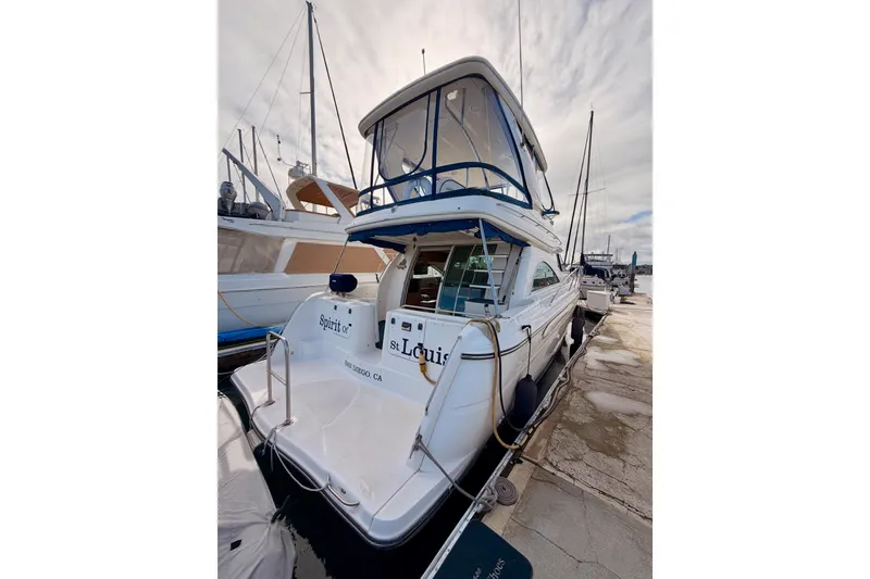 Slide: The Image of 2001 Maxum 4600 SCB Limited Edition yacht docked at marina. - 5