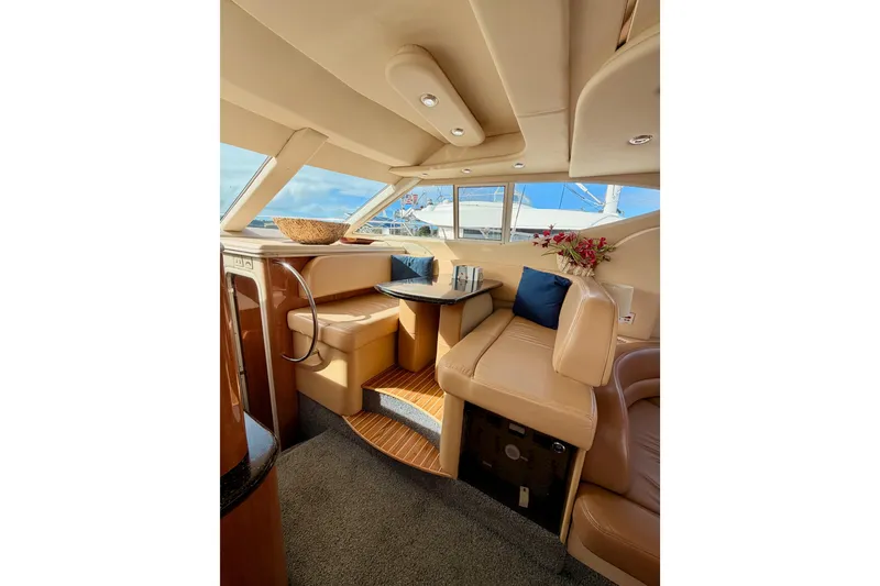 Slide: The Image of Luxurious interior of 2001 Maxum 4600 SCB yacht with leather seating and elegant decor. - 52
