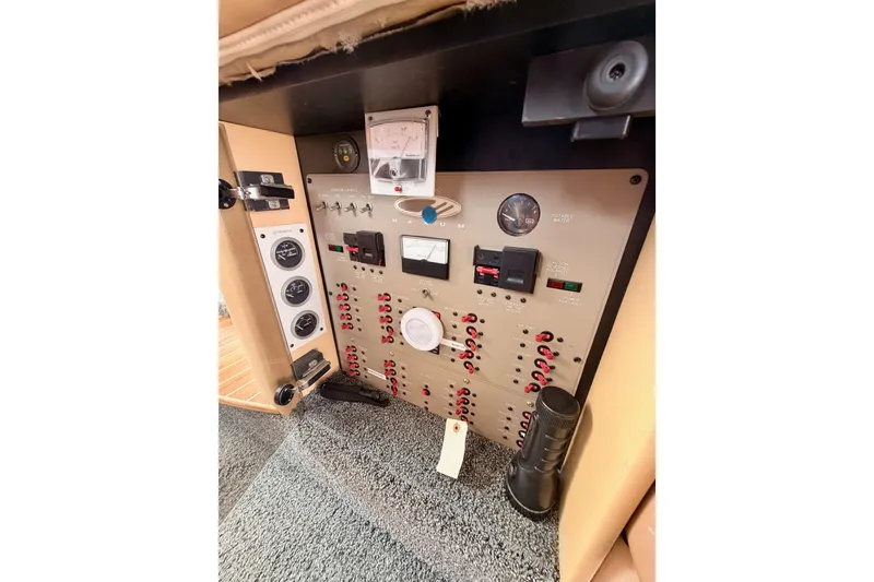 Slide: The Image of Control panel of 2001 Maxum 4600 SCB Limited Edition yacht with gauges and switches. - 53