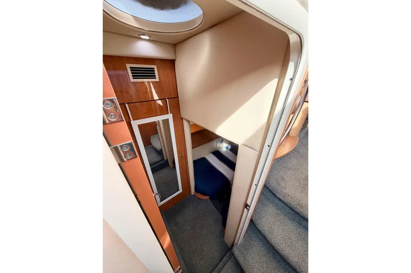 Slide: The Image of Interior view of 2001 Maxum 4600 SCB Limited Edition yacht cabin with wood accents. - 58