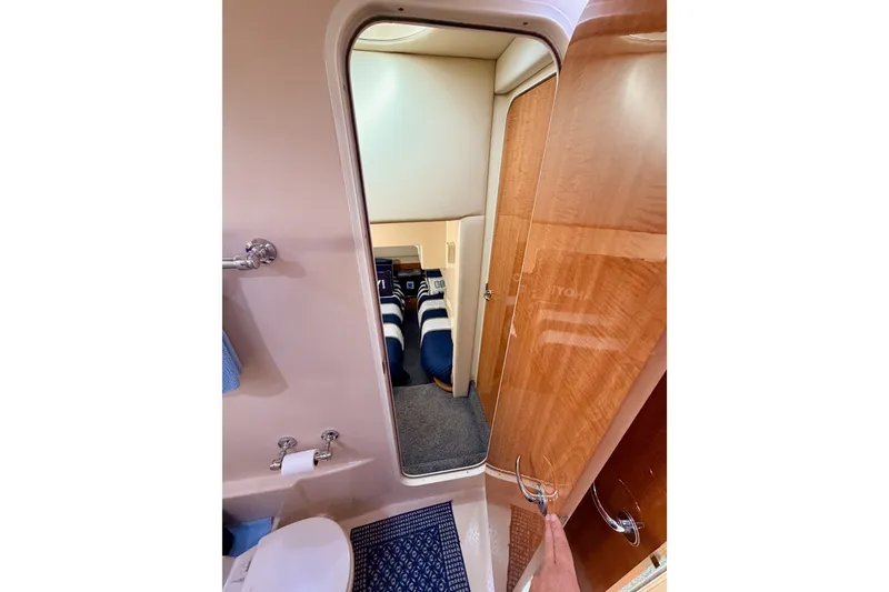 Slide: The Image of Interior view of 2001 Maxum 4600 SCB Limited Edition yacht bathroom and cabin. - 63
