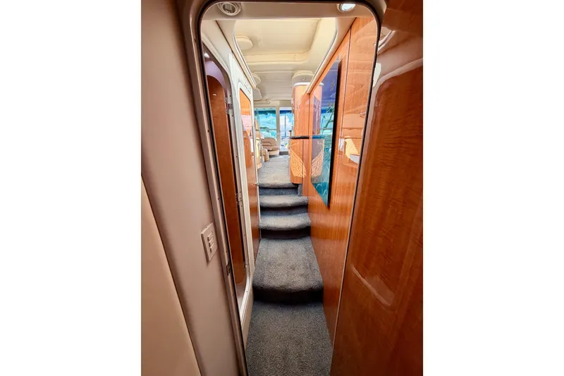 Slide: The Image of Interior hallway of 2001 Maxum 4600 SCB Limited Edition yacht with carpeted steps. - 76