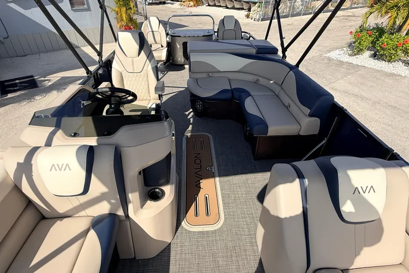 Slide: The Image of 2026 Avalon 2385 LSZ Rear Fish Tri Toon interior with luxurious seating and modern design. - 18