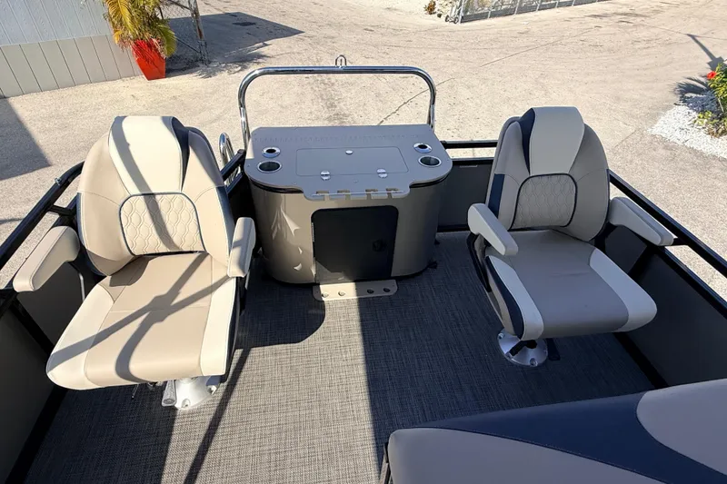 Slide: The Image of 2026 Avalon 2385 LSZ Rear Fish Tri Toon boat interior with two seats and console. - 21