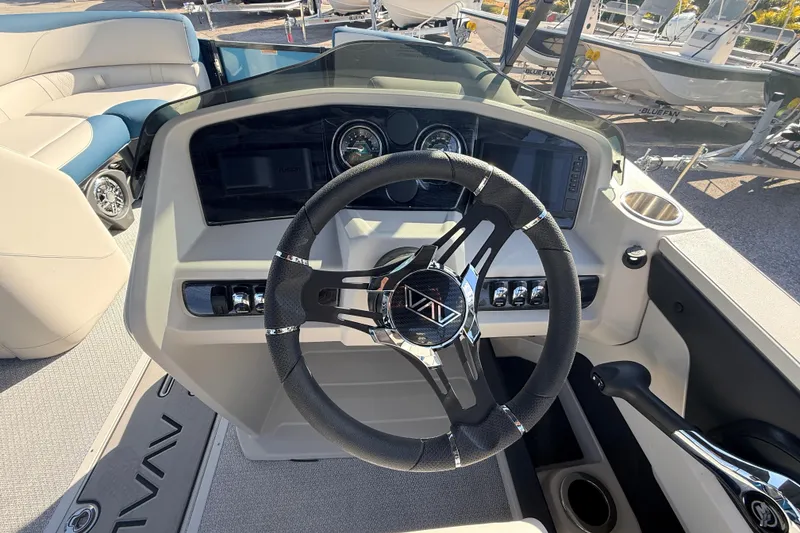 Slide: The Image of Steering console of 2026 Avalon 2385 LSZ Quad Lounger, featuring modern controls and design. - 26
