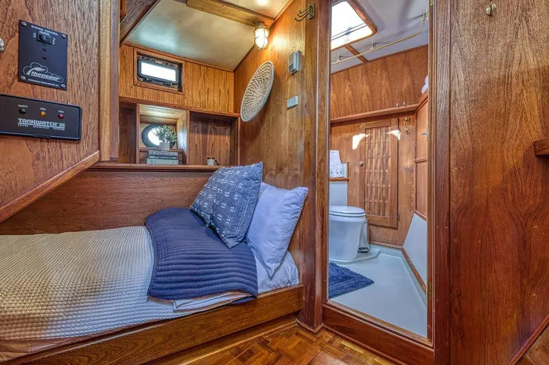 Slide: The Image of Cozy wooden cabin interior with bed and bathroom, Nielsen 46, 1981 model. - 10