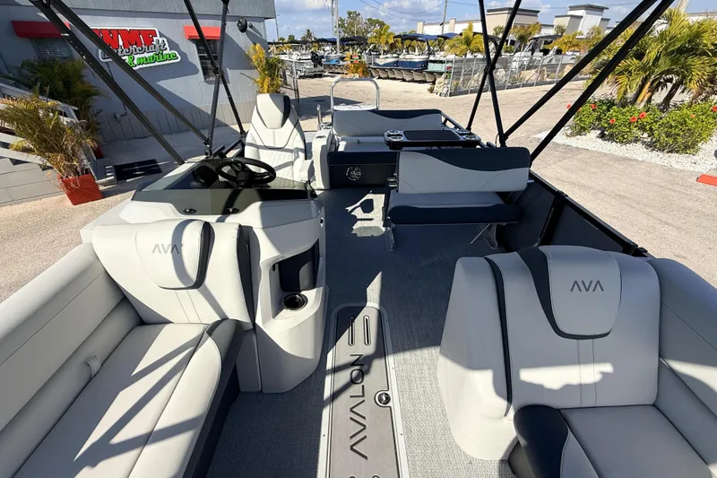 Slide: The Image of 2026 Avalon 2585 LSZ Entertainer Tri Toon boat interior with luxurious seating and modern design. - 20