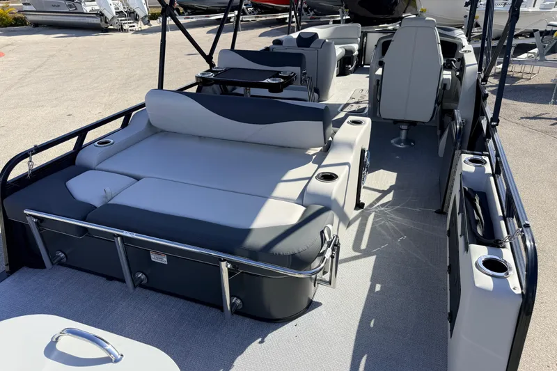 Slide: The Image of 2026 Avalon 2585 LSZ Entertainer Tri Toon boat with luxurious seating and high-performance features. - 12