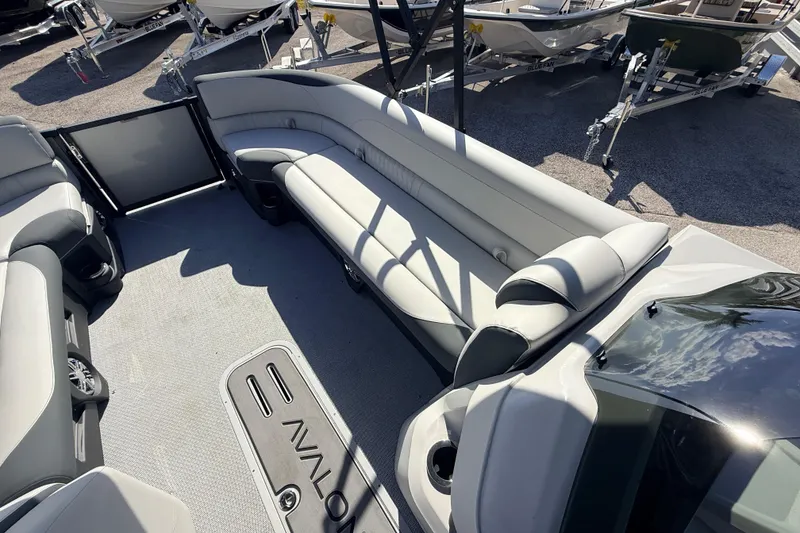 Slide: The Image of 2026 Avalon 2585 LSZ Entertainer boat interior with plush seating and modern design. - 18