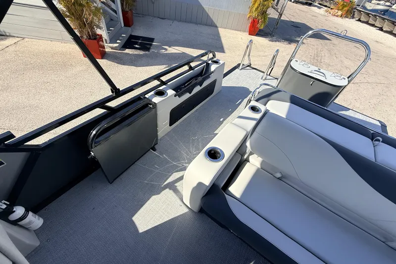 Slide: The Image of 2026 Avalon 2585 LSZ Entertainer interior with seating and storage, showcasing modern design. - 24