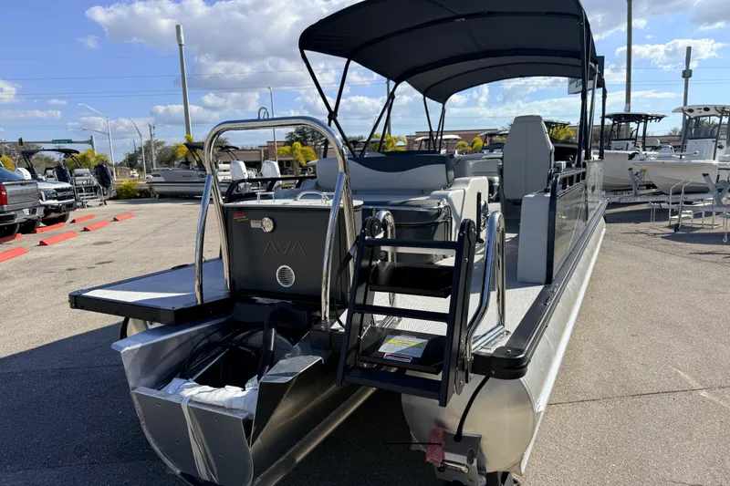 Slide: The Image of 2026 Avalon 2585 LSZ Entertainer Tri Toon boat with swing back, high performance design. - 8