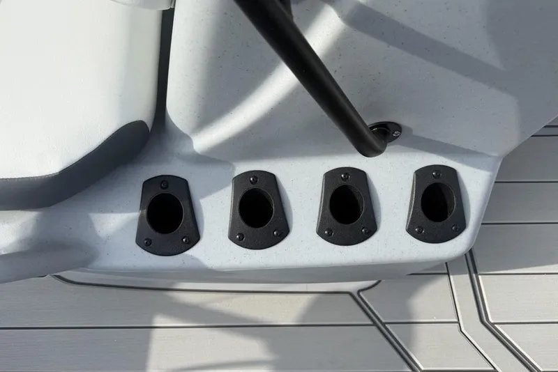 Slide: The Image of 2026 Tracker Bass Tracker Classic CC boat rod holders on deck. - 12