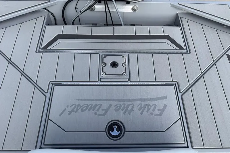 Slide: The Image of 2026 Tracker Bass Tracker Classic CC boat deck with sleek gray finish and modern design. - 18