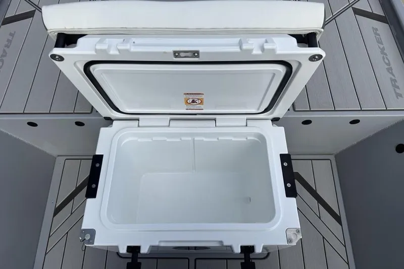 Slide: The Image of Open cooler on 2026 Tracker Bass Tracker Classic CC boat deck. - 19