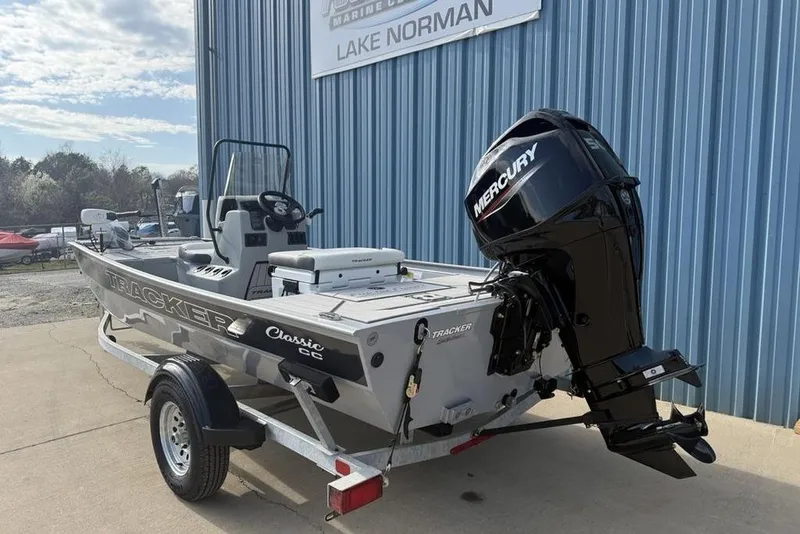 Slide: The Image of 2026 Tracker Bass Tracker Classic CC boat with Mercury engine on trailer. - 4