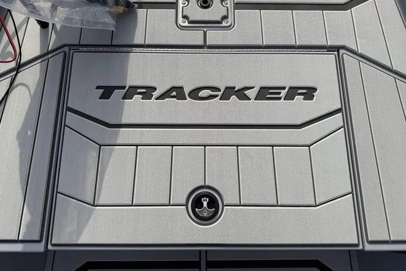 Slide: The Image of 2026 Tracker Bass Tracker Classic CC boat deck with logo and sleek design. - 6
