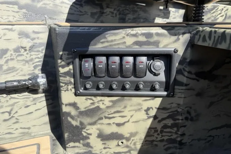 Slide: The Image of Control panel of 2026 Tracker Grizzly 1650 T Prairie Wings Edition boat. - 14