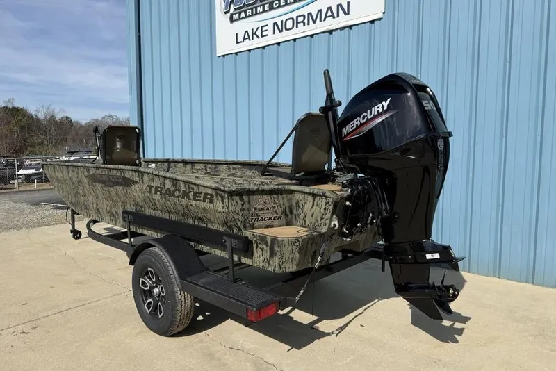 Slide: The Image of 2026 Tracker Grizzly 1650 T Prairie Wings Edition boat with Mercury engine at Lake Norman. - 2