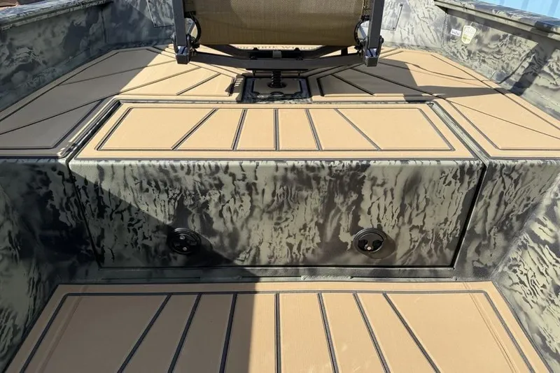 Slide: The Image of 2026 Tracker Grizzly 1650 T Prairie Wings Edition boat interior with camo design and seating. - 6