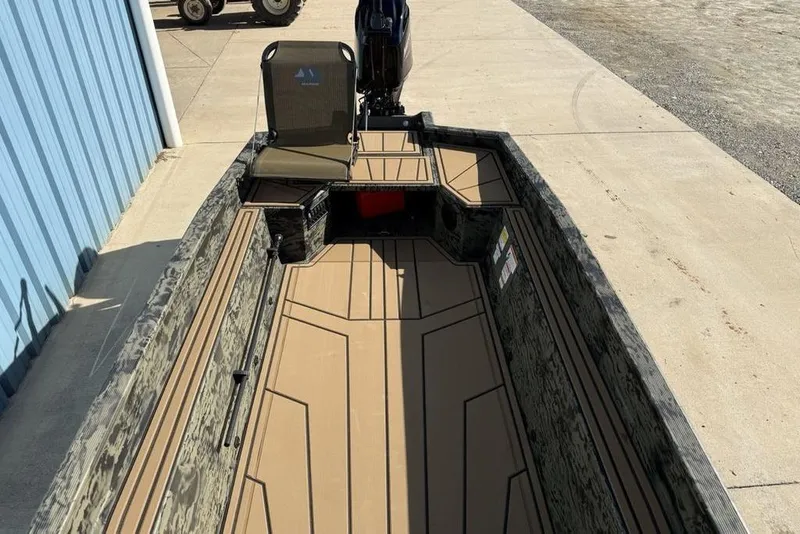 Slide: The Image of 2026 Tracker Grizzly 1650 T Prairie Wings Edition boat with camo design and spacious interior. - 8
