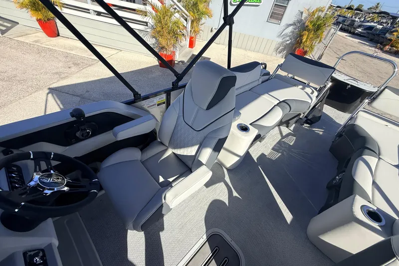 Slide: The Image of 2026 Avalon 2385 LSZ Quad Lounger boat interior with luxurious seating and modern design. - 17