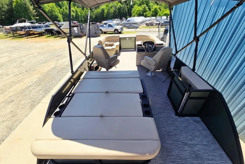 Slide: The Image of 2025 Godfrey Xperience 2086 SFLX pontoon boat with spacious seating and modern design. - 10