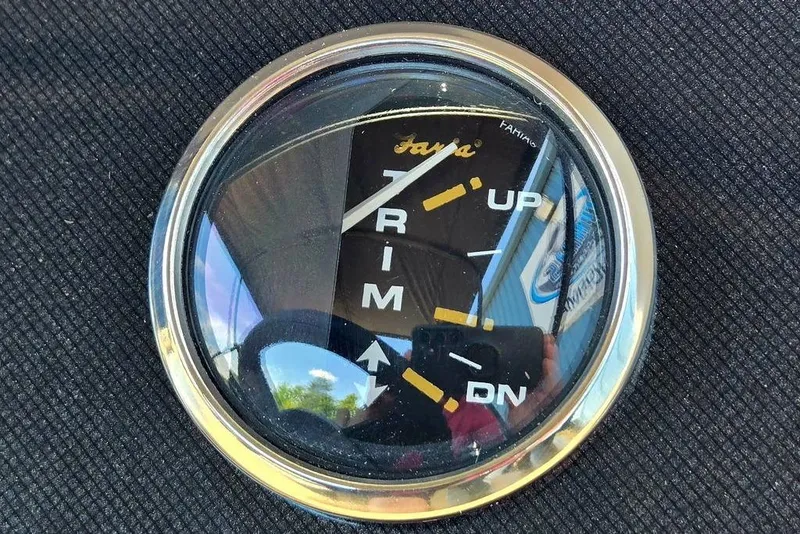 Slide: The Image of Close-up of a trim gauge on a 2025 Godfrey Xperience 2086 SFLX boat. - 13