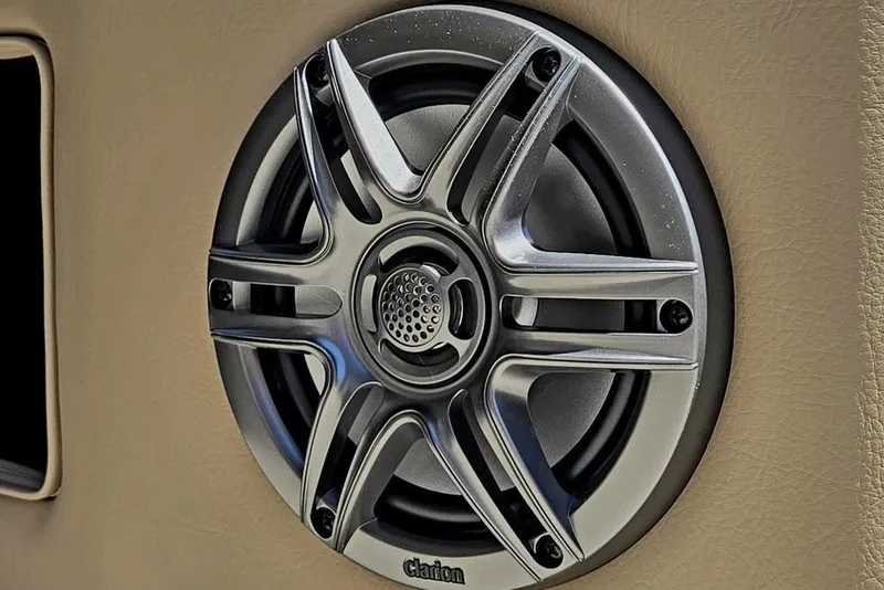 Slide: The Image of Close-up of a Clarion speaker in a 2025 Godfrey Xperience 2086 SFLX boat. - 21