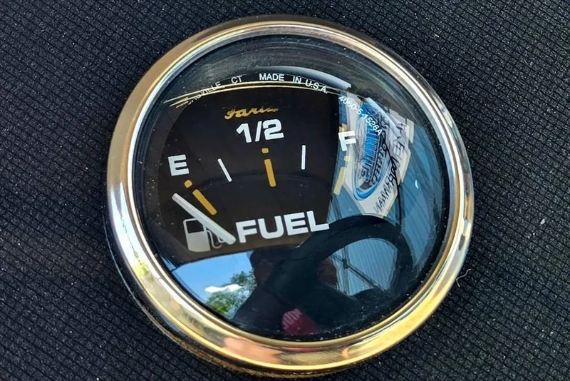 Slide: The Image of Fuel gauge showing half full on Godfrey Xperience 2086 SFLX 25 in. Package, 2025 model. - 22