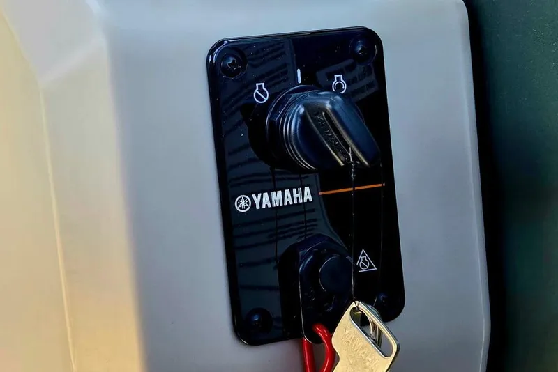 Slide: The Image of Yamaha ignition switch on 2025 Godfrey Xperience 2086 SFLX boat. - 33