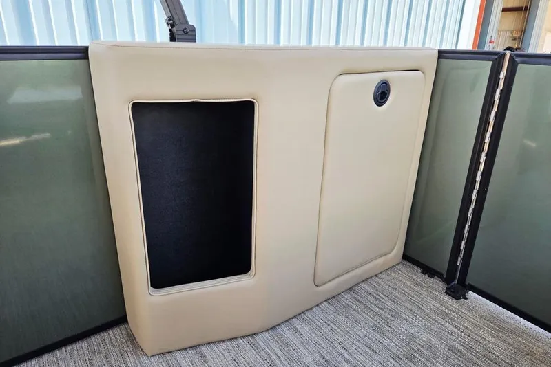 Slide: The Image of Interior detail of 2025 Godfrey Xperience 2086 SFLX, featuring beige paneling and storage compartment. - 34