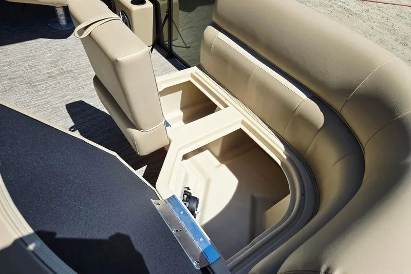 Slide: The Image of 2025 Godfrey Xperience 2086 SFLX boat interior with open storage compartment. - 7