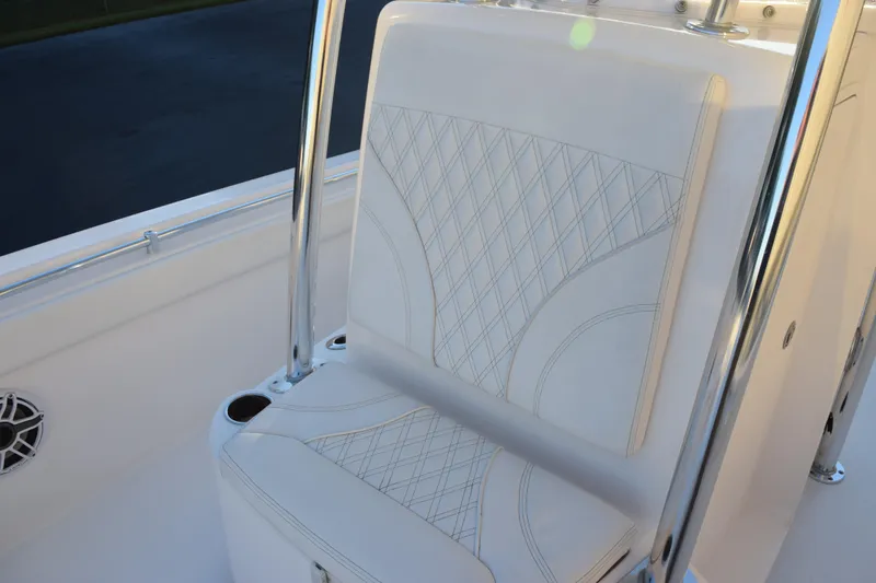 Slide: The Image of 2023 Contender 24 Sport boat seat with diamond-stitched upholstery and stainless steel frame. - 15