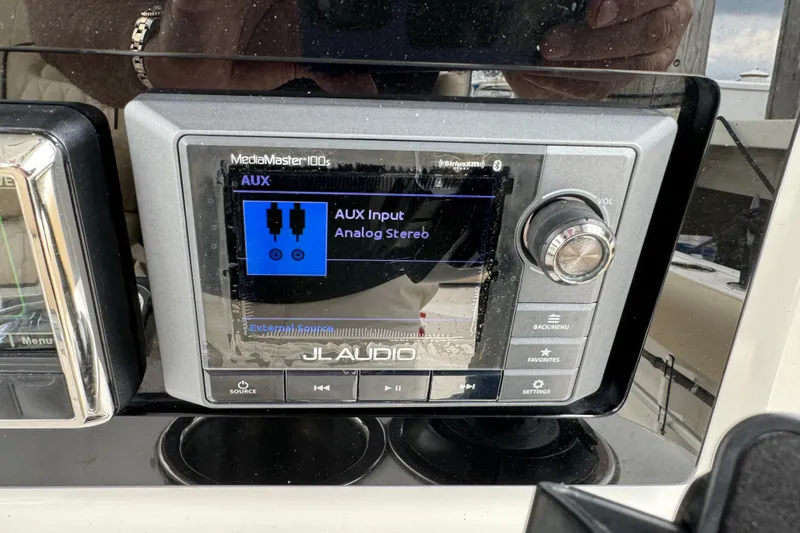 Slide: The Image of JL Audio MediaMaster 100s stereo system on 2017 Sea Fox 288 Commander boat. - 10