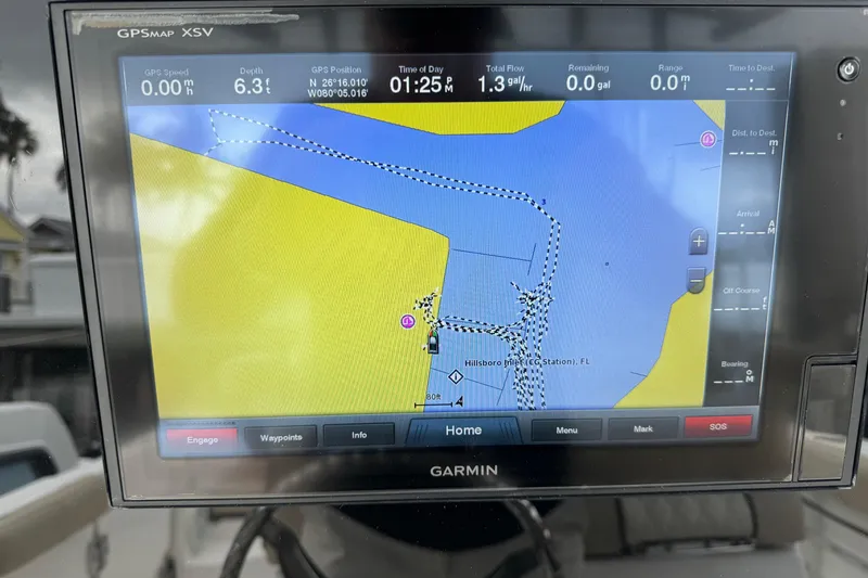 Slide: The Image of Garmin GPS display on 2017 Sea Fox 288 Commander, showing navigation map and data. - 13