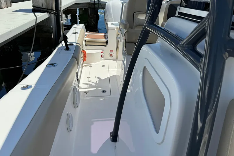 Slide: The Image of 2017 Sea Fox 288 Commander boat interior with seating and storage compartments. - 24