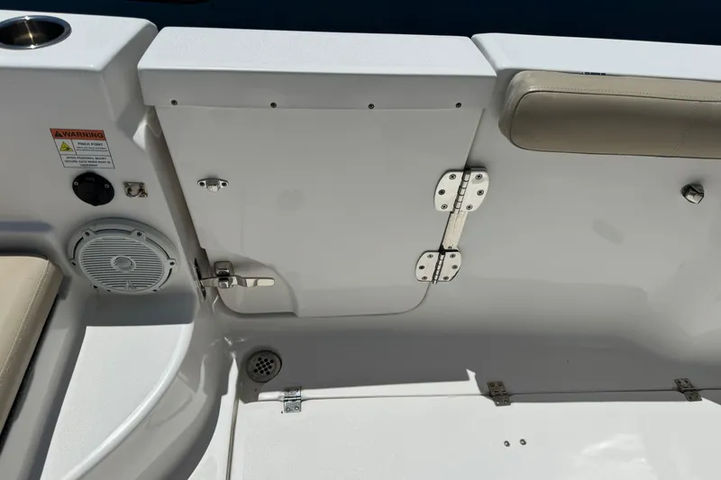 Slide: The Image of Interior view of a 2017 Sea Fox 288 Commander boat, featuring seating and storage. - 25