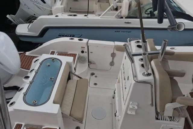 Slide: The Image of 2017 Sea Fox 288 Commander boat interior with seating and fishing equipment. - 28