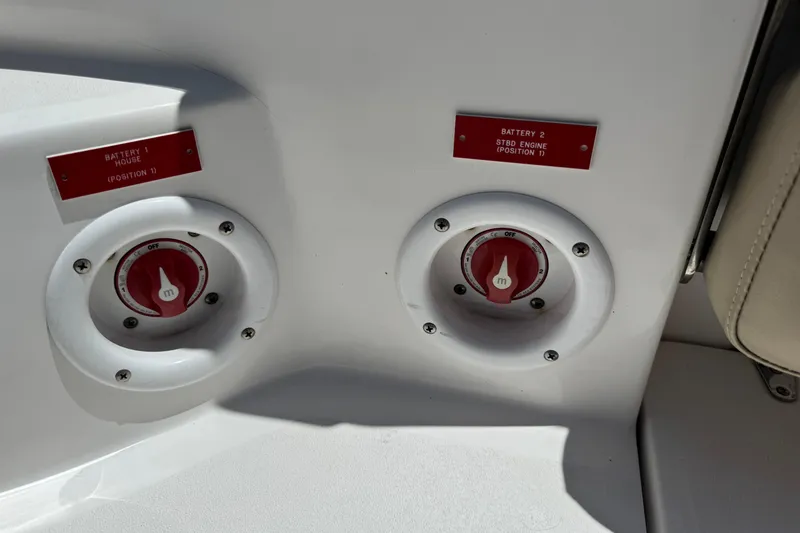 Slide: The Image of Battery switches on a 2017 Sea Fox 288 Commander boat, labeled for house and engine. - 30